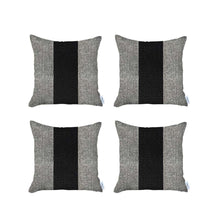 Juego de 4 fundas de almohada central gris y negro.