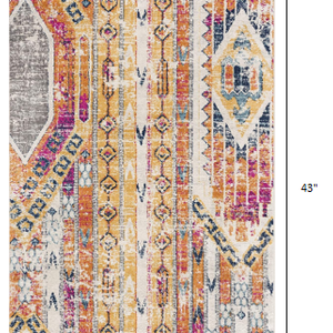 2’ X 4’ Gold And Ivory Distressed Tribal Area Rug