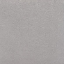 Sillón capitoné negro y piel sintética gris de 29