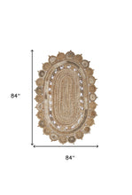 7’ Oval Shaped Natural Toned Area Rug