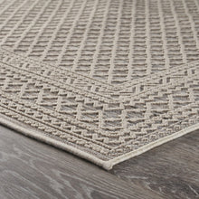 5' X 7' Tan/Brown Indoor Outdoor Area Rug