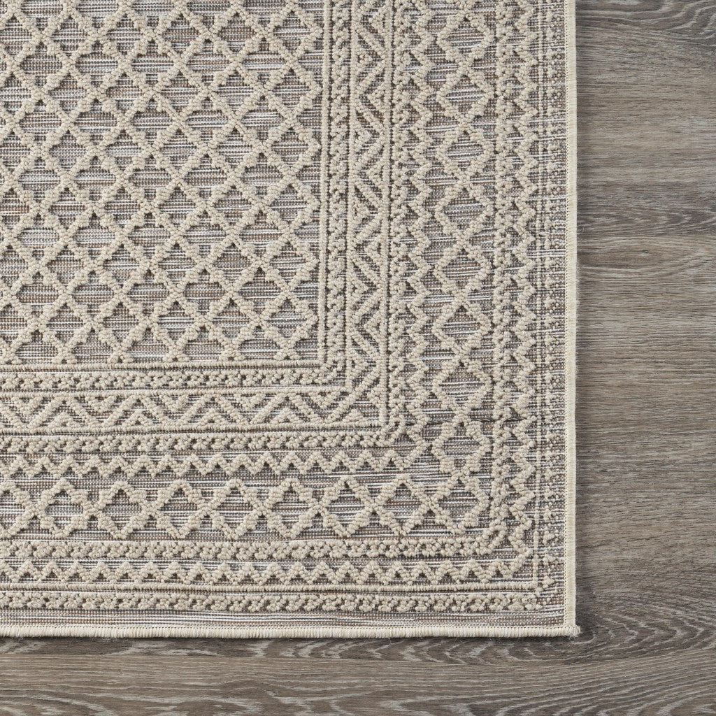 5' X 7' Tan/Brown Indoor Outdoor Area Rug