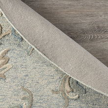 5’ Round Blue and Cream Filigree Area Rug