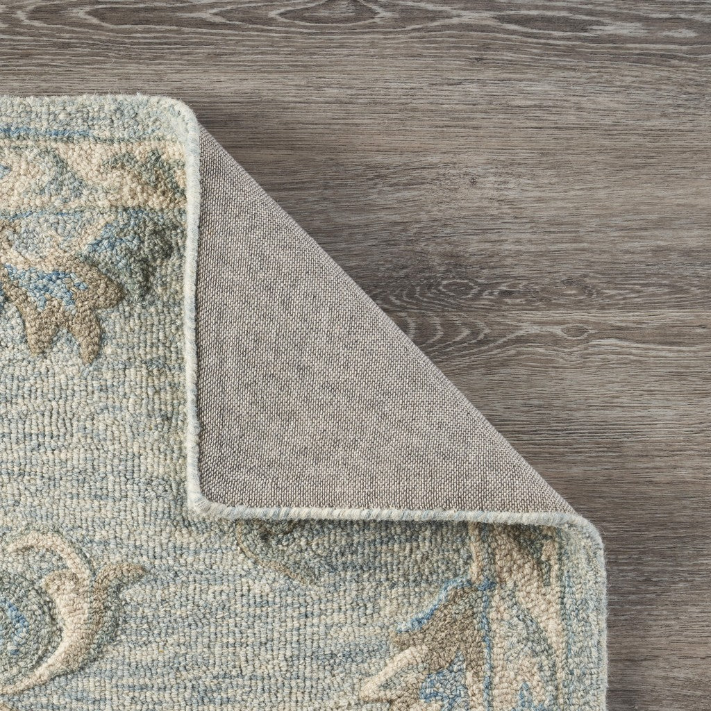 5’ Round Blue and Cream Filigree Area Rug