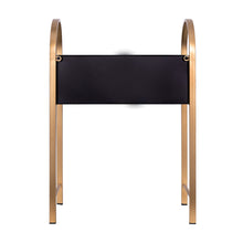 Macetero de metal dorado y negro