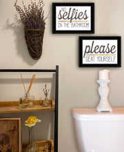 Set Of Two No Selfies When Seated 2 Black Framed Print Wall Art