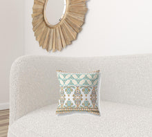 16 英寸 X 16 英寸橙色和青色模板吹製縫絨面革抱枕