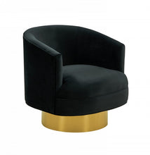 Sillón moderno de terciopelo negro y dorado