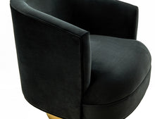 Sillón moderno de terciopelo negro y dorado