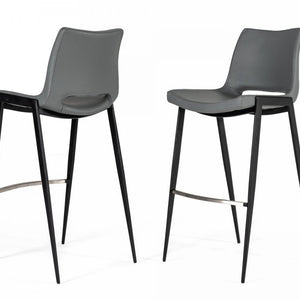 Set Of Two 42" Grey Faux Leather And Stainless Steel Bar Height Chairs With Footrest