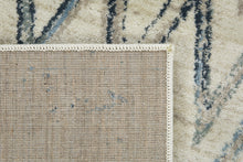 8’ x 11’ Beige Blue Distressed Chevron Area Rug