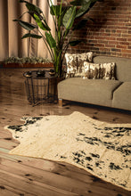 5' X 8' Off White Black and Gold Faux Cowhide Washable Area Rug
