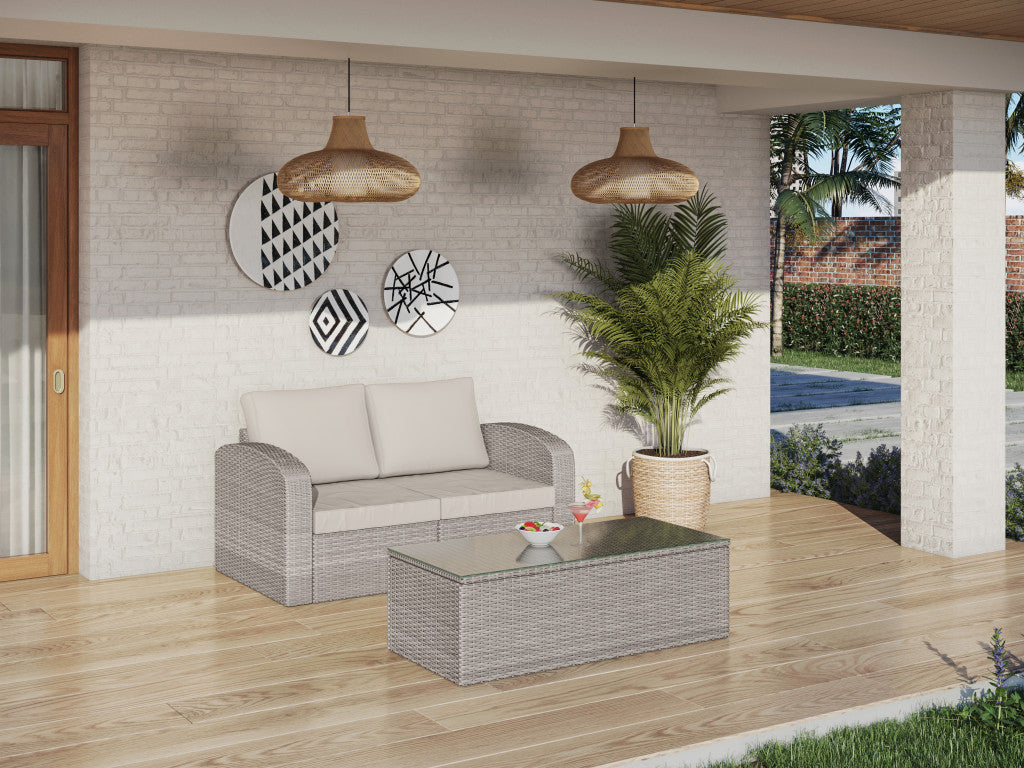 32" Beige Faux Rattan and Tan Cushion Outdoor Loveseat