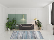 8' X 11' Turquoise and Gray Abstract Stain Resistant Area Rug