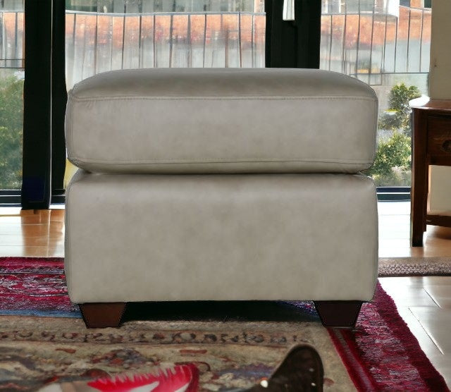 22" Stone Taupe Genuine Leather And Walnut Ottoman