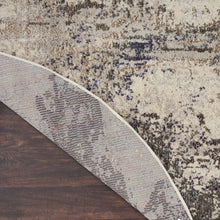 4' X 4' Ivory And Grey Round Abstract Power Loom Non Skid Area Rug