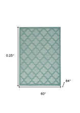 5' X 7' Aqua And Teal Ikat Indoor Outdoor Area Rug