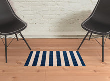 2' X 3' Navy And Sand Striped Tufted Washable Non Skid Area Rug