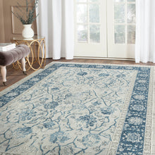 5' X 8' Blue Gray And Ivory Floral Power Loom Stain Resistant Area Rug