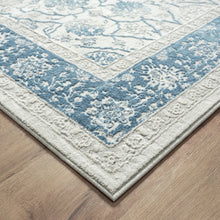 8' X 10' Blue Gray And Ivory Floral Power Loom Stain Resistant Area Rug