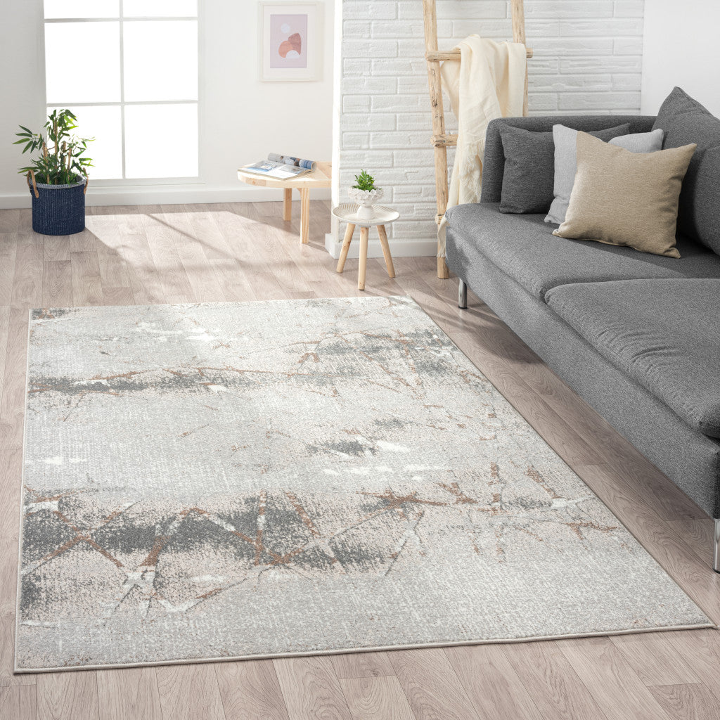 5' X 7' Beige Gray And Brown Abstract Stain Resistant Area Rug