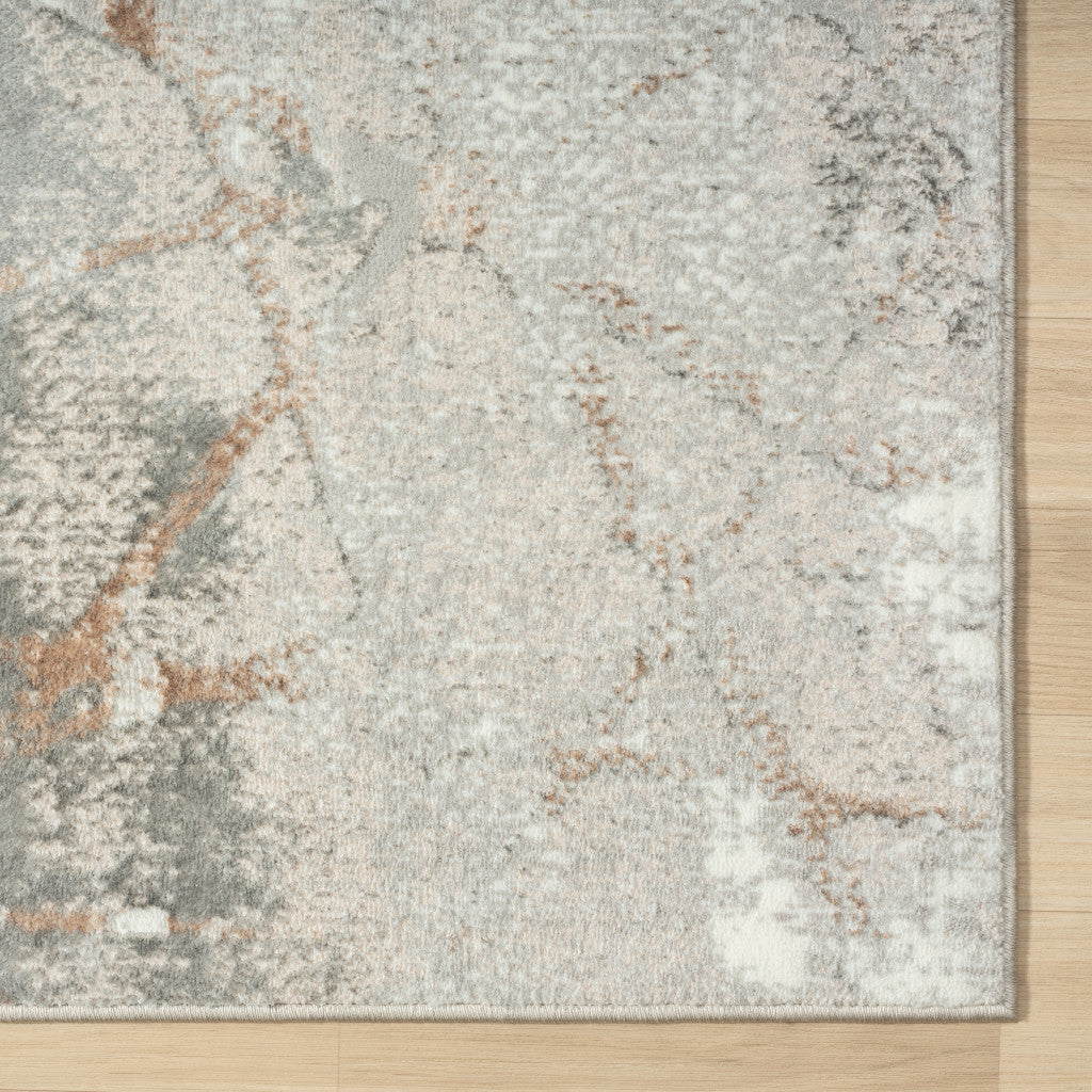 5' X 7' Beige Gray And Brown Abstract Stain Resistant Area Rug