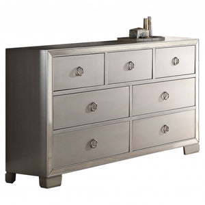57" Platinum Manufactured Wood Seven Drawer Triple Dresser