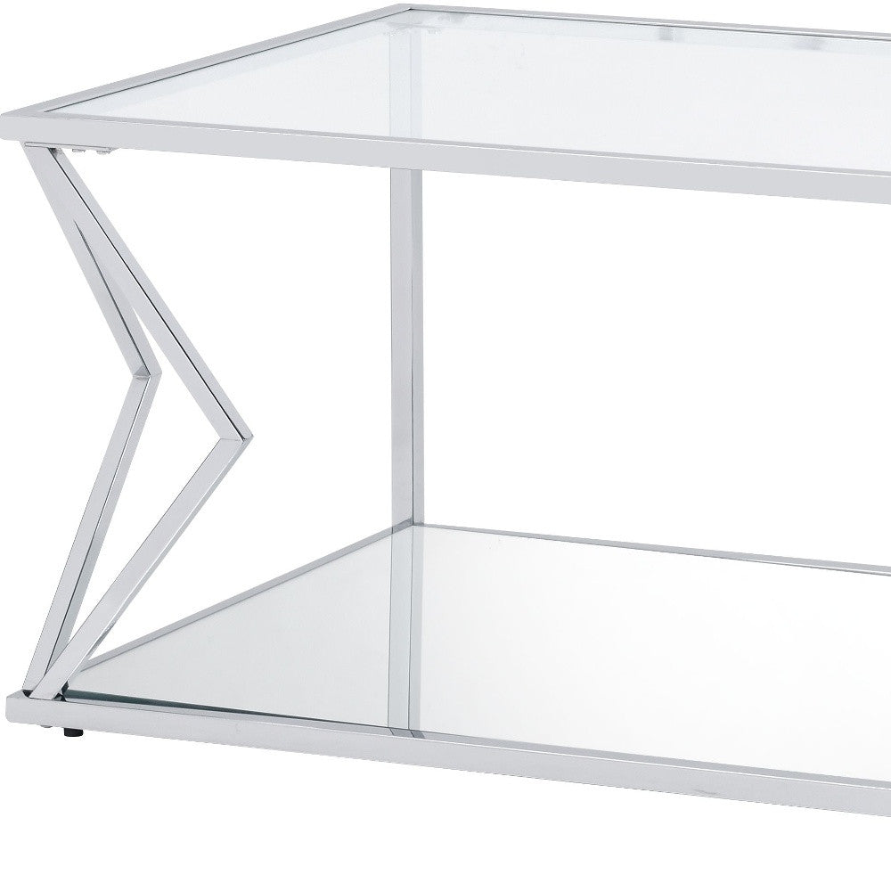 Mesa de centro rectangular de 43" de cromo y vidrio transparente con estante