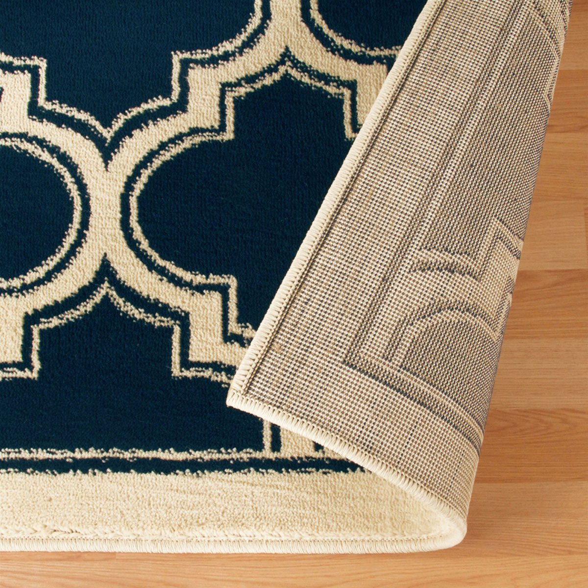 8' Dark Blue And Cream Geometric Stain Resistant Runner Rug