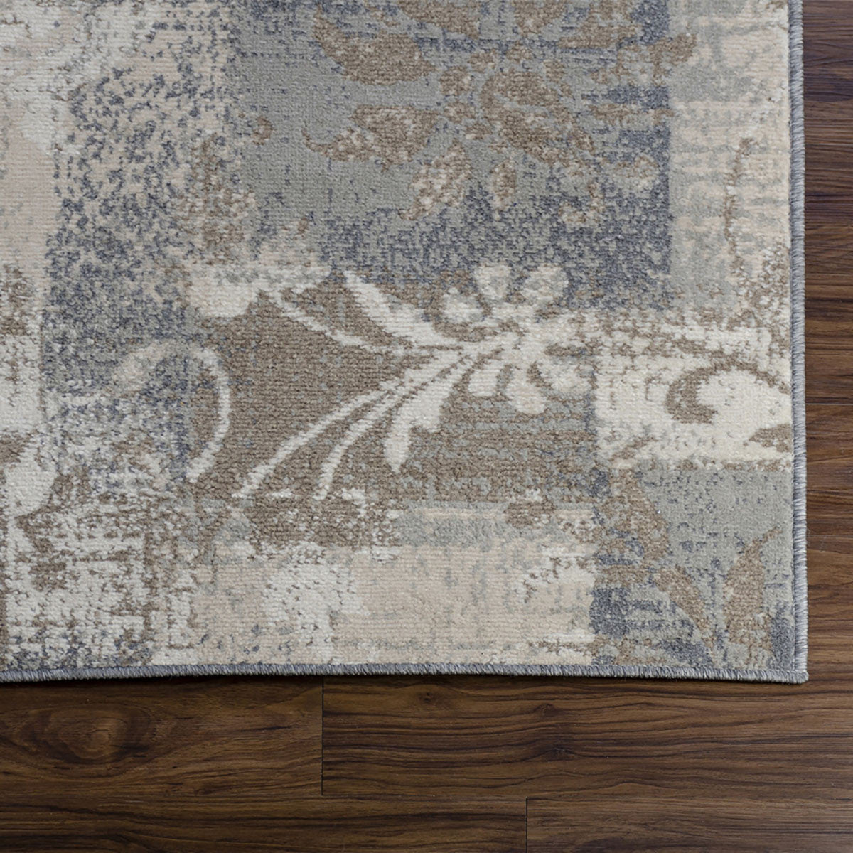 5' X 8' Brown And Ivory Floral Power Loom Distressed Stain Resistant Area Rug