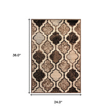 2' X 3' Ivory Quatrefoil Power Loom Distressed Stain Resistant Area Rug
