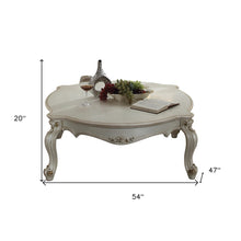 Mesa de centro rectangular de polirresina y madera fabricada en perla antigua de 54