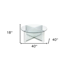 Mesa de centro con base brillante y parte superior redonda plateada y de vidrio transparente de 40