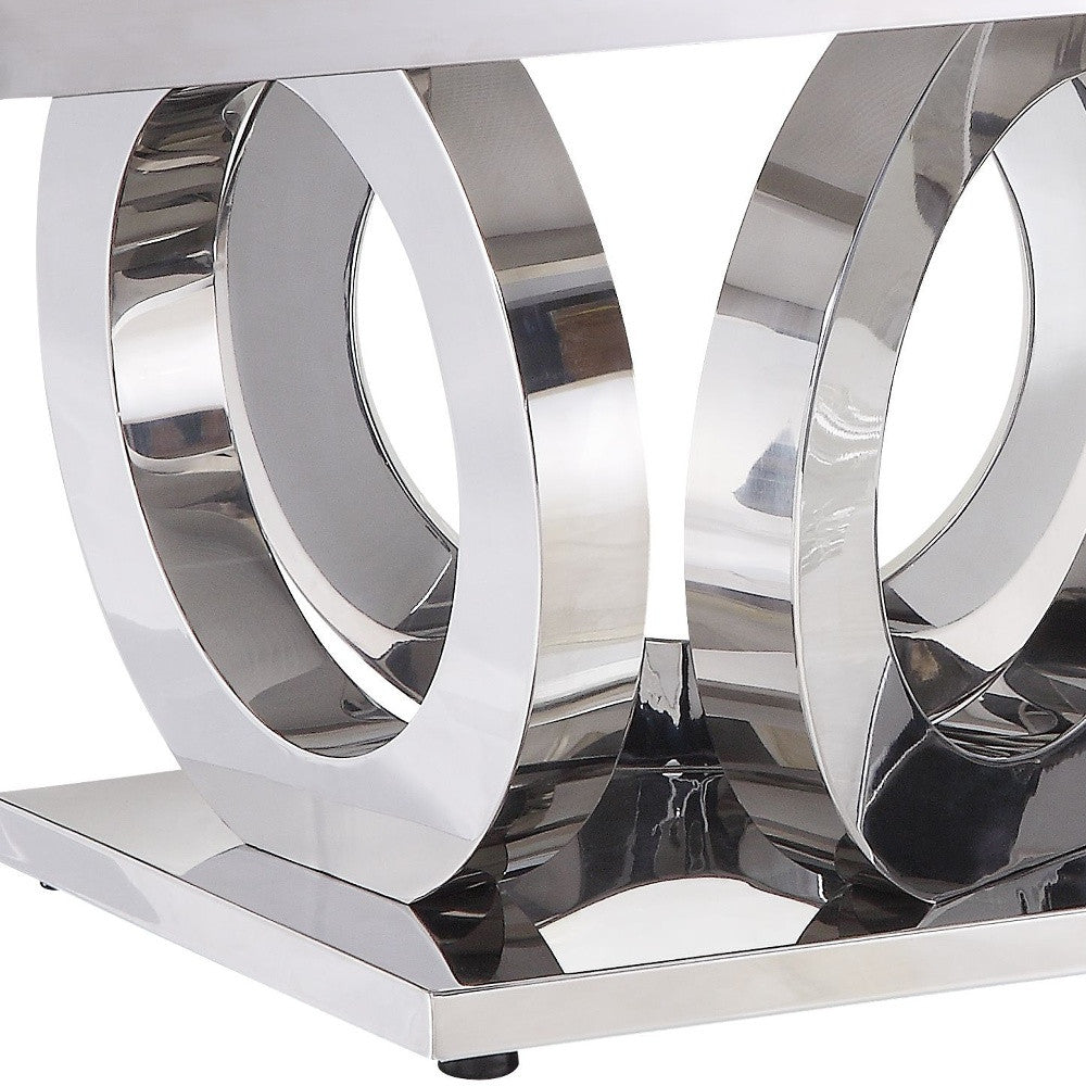 Mesa de centro rectangular con espejo de acero inoxidable y mármol artificial con estampado gris y plateado espejado de 51"