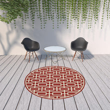 8' Red Round Geometric Stain Resistant Indoor Outdoor Area Rug