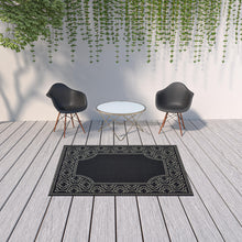 5' X 8' Black Stain Resistant Indoor Outdoor Area Rug