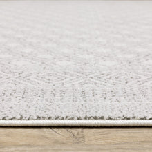 5' X 8' White And Grey Oriental Power Loom Stain Resistant Area Rug