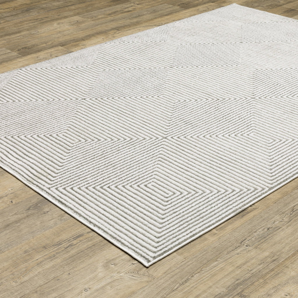 5' X 8' Grey And White Geometric Power Loom Stain Resistant Area Rug