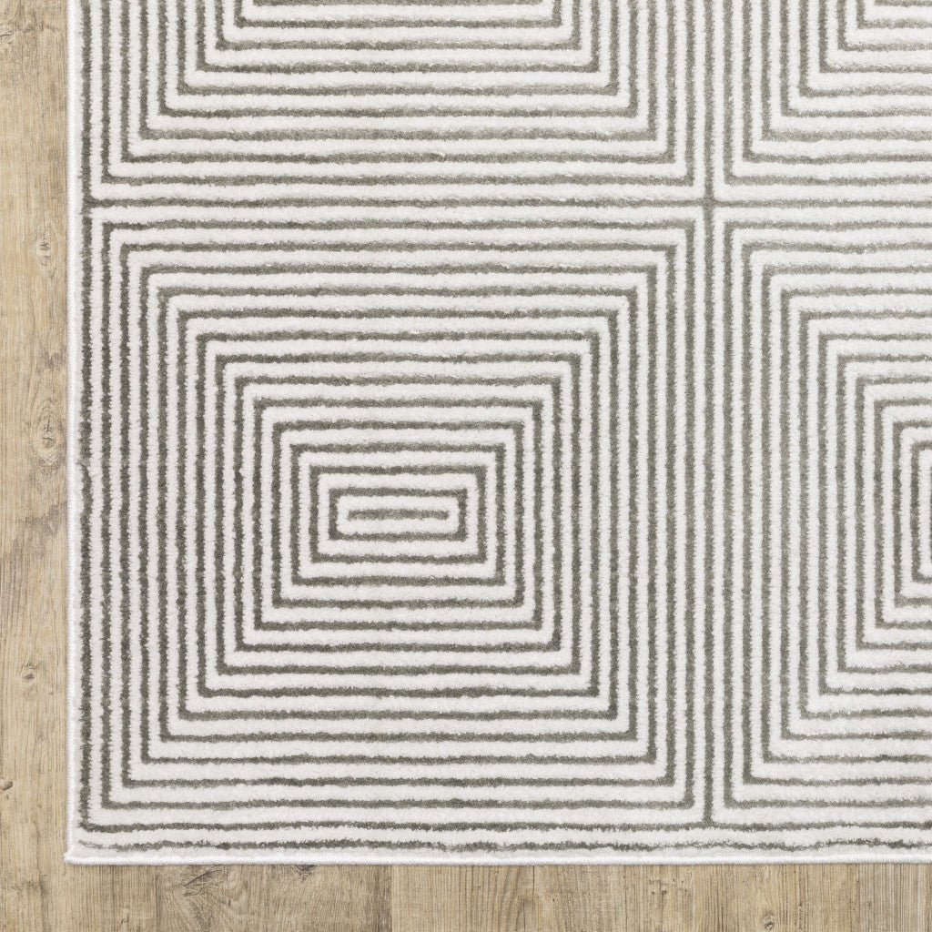 5' X 8' Grey And White Geometric Power Loom Stain Resistant Area Rug
