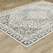 5' X 8' Grey And White Oriental Power Loom Stain Resistant Area Rug
