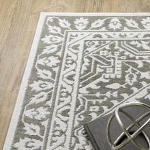 5' X 8' Grey And White Oriental Power Loom Stain Resistant Area Rug