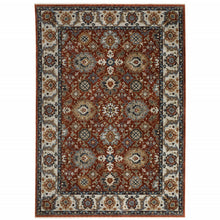 8' X 11' Red Blue Ivory Gold And Navy Oriental Power Loom Stain Resistant Area Rug With Fringe