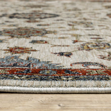 5' X 8' Beige Rust Red Blue Gold And Grey Oriental Power Loom Stain Resistant Area Rug With Fringe