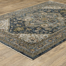 8' X 11' Blue Taupe Grey Green Rust Tan Beige And Gold Oriental Power Loom Stain Resistant Area Rug With Fringe