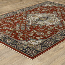 8' X 11' Red Ivory Blue Navy Gold And Grey Oriental Power Loom Stain Resistant Area Rug With Fringe