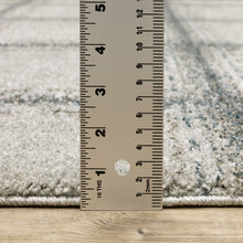 3' X 5' Grey Teal And Beige Geometric Power Loom Stain Resistant Area Rug