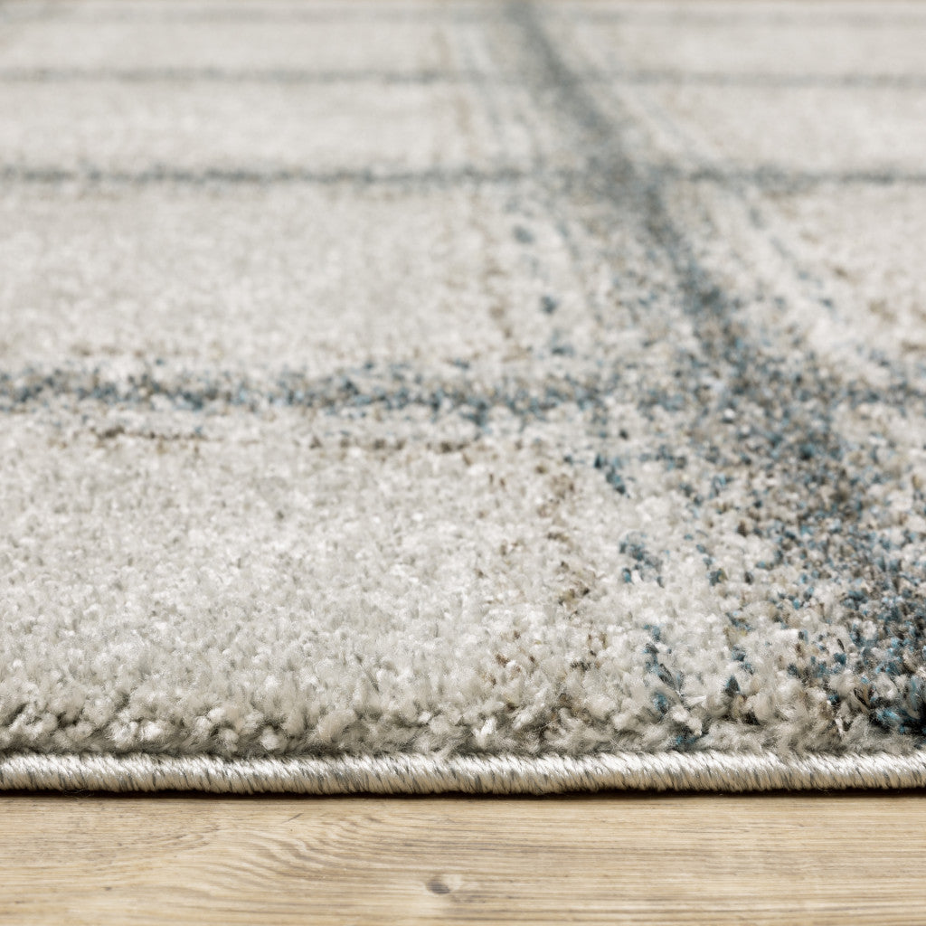 5' X 8' Grey Teal And Beige Geometric Power Loom Stain Resistant Area Rug