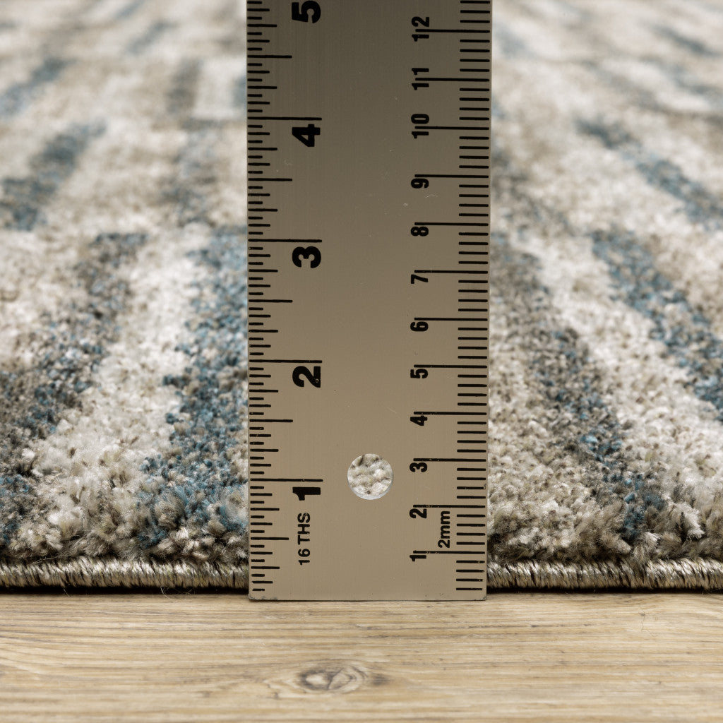 6' X 9' Teal Blue Grey And Tan Geometric Power Loom Stain Resistant Area Rug