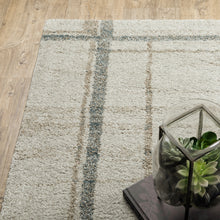 3' X 5' Grey Teal Beige And Tan Geometric Power Loom Stain Resistant Area Rug