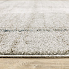 10' X 13' Grey Teal Beige And Tan Geometric Power Loom Stain Resistant Area Rug